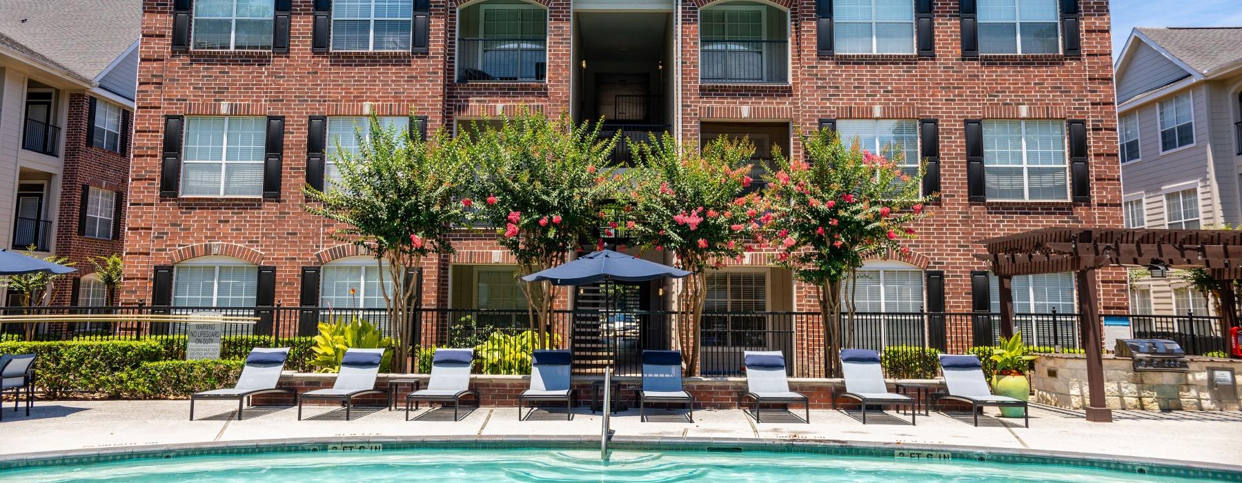 a pool in front of a building