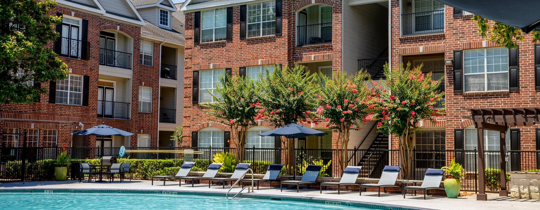 a pool in front of a building