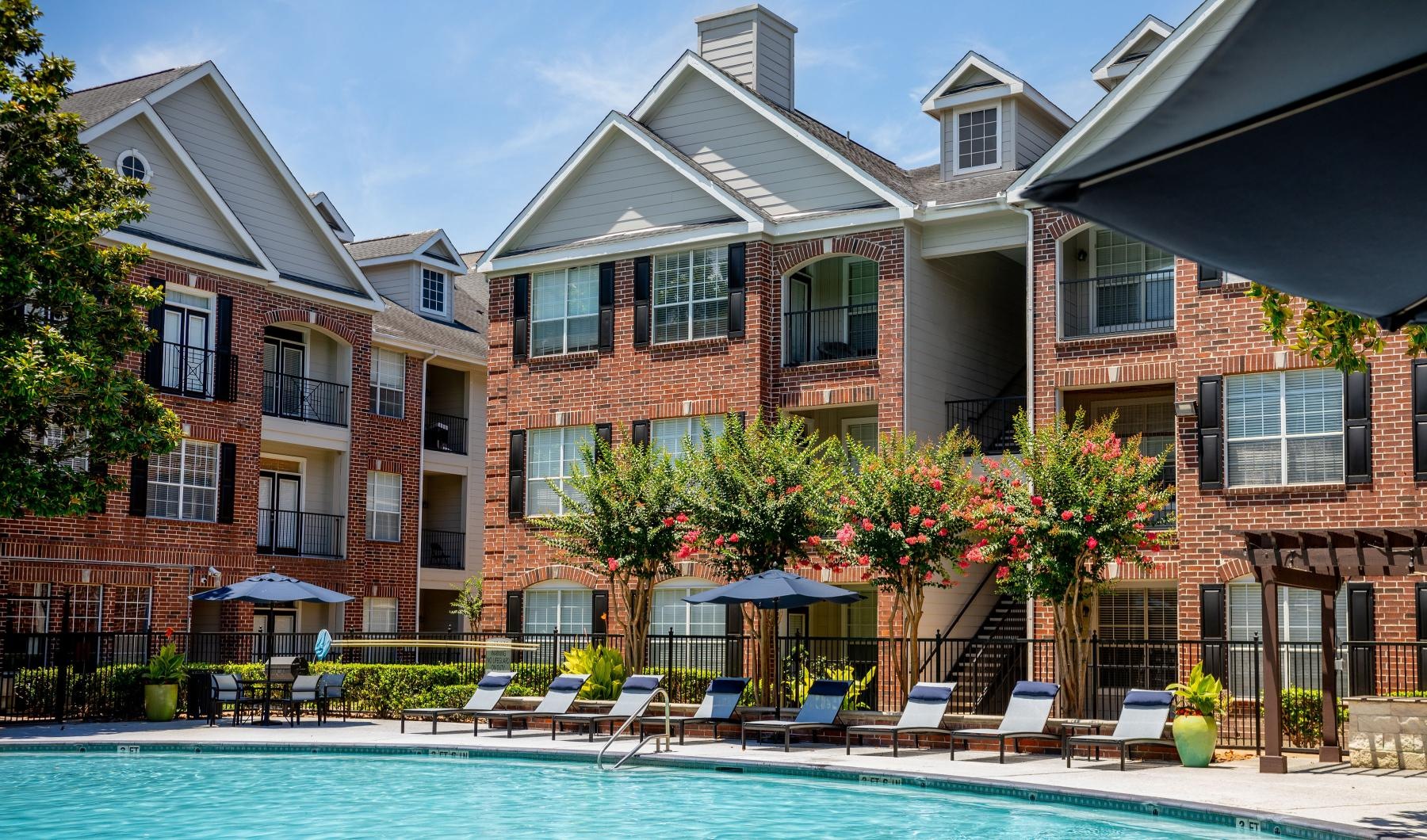 a pool in front of a building