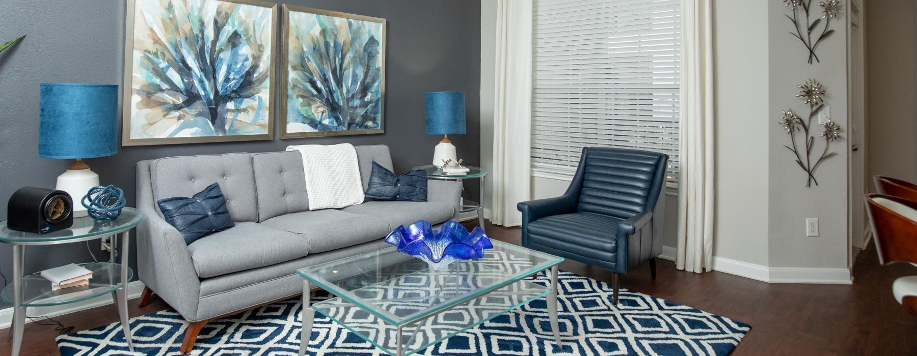 a living room with a couch and a table